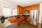 Spread out and make memories in this condos beautiful Kitchen 
